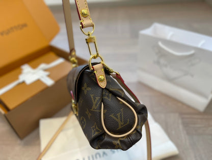 LV Pochette Métis Monogram Canvas Handle Crossbody Bag with Leather Trim and Shoulder Strap