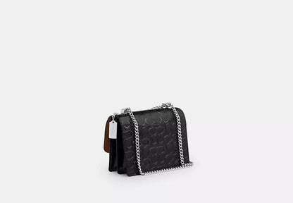 Klare Crossbody Bag In Signature Leather